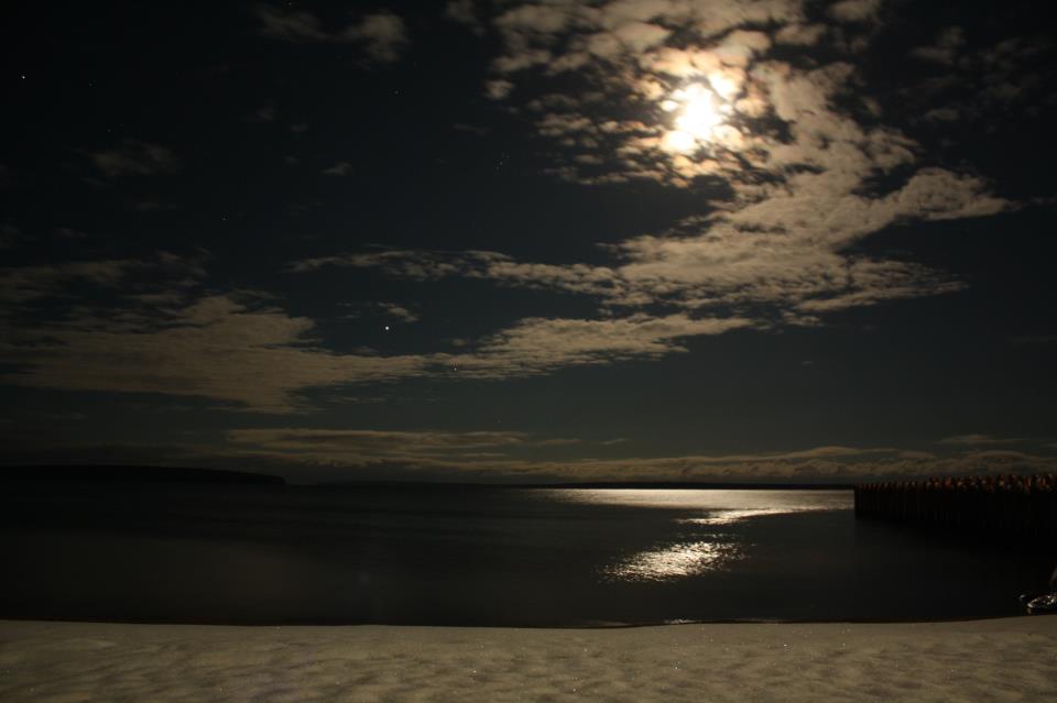 November 26, 2012 photo of Jupiter near the moon over Lake Superior in northern Wisconsin by Migizi Gichigumi